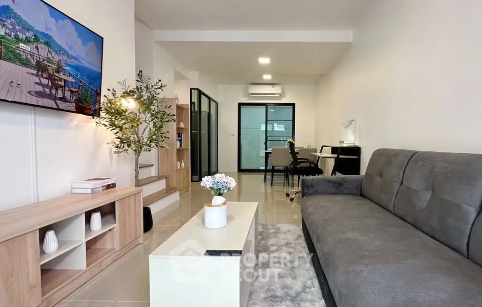 Modern living room with sleek furniture and stylish decor