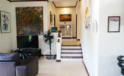 Stylish living room with modern art and cozy seating area