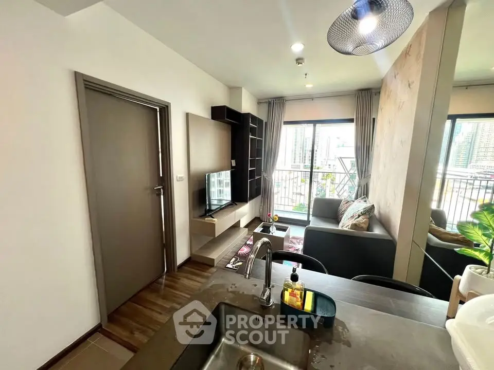 Modern living room with balcony view in a stylish apartment