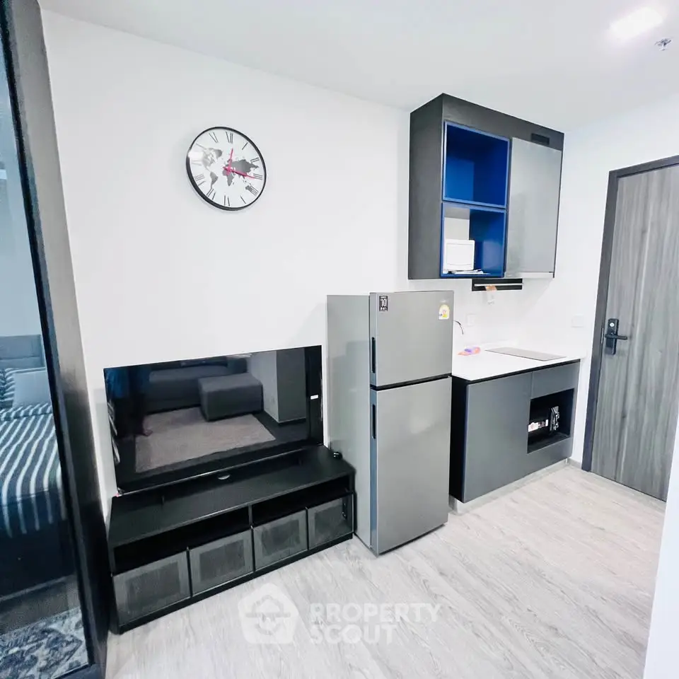 Modern apartment interior with sleek kitchen and stylish living area