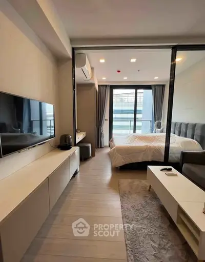 Modern bedroom with balcony view in a stylish apartment