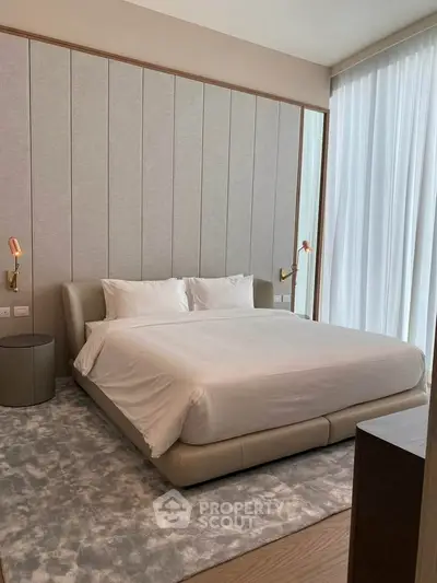 Luxurious modern bedroom with elegant design and plush bedding