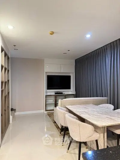 Modern living room with elegant dining area and stylish furniture
