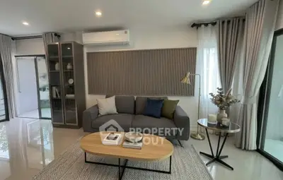 Modern living room with stylish decor and natural light