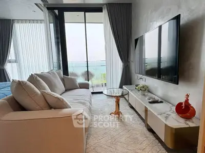 Luxurious living room with modern decor and stunning balcony view