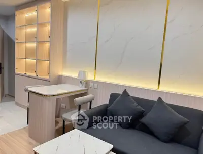 Modern living room with elegant lighting and stylish furniture