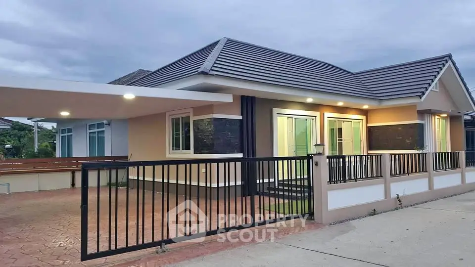 Charming single-story home with modern design and spacious driveway in a serene neighborhood.