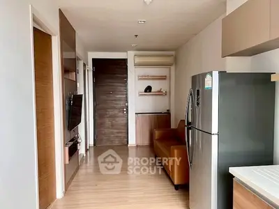 Modern apartment interior with sleek kitchen and cozy living area