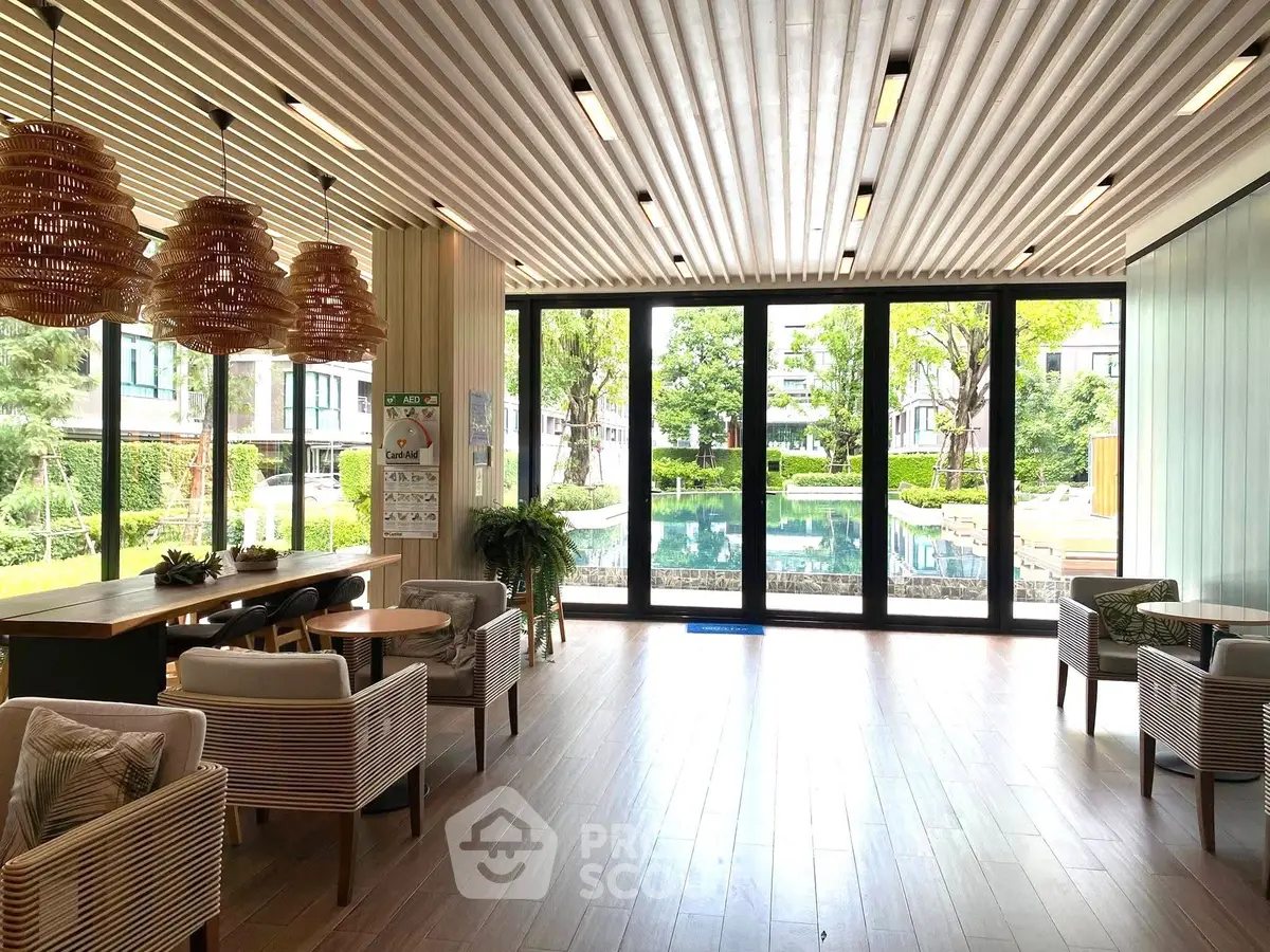 Luxurious modern lounge with pool view and stylish decor