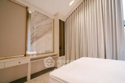 Luxurious bedroom with elegant marble accents and soft lighting
