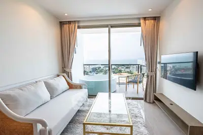 Luxurious living room with stunning balcony view and elegant decor