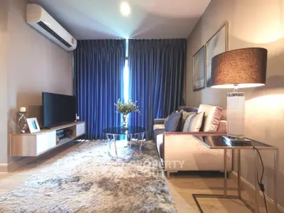 Stylish modern living room with cozy seating and elegant decor