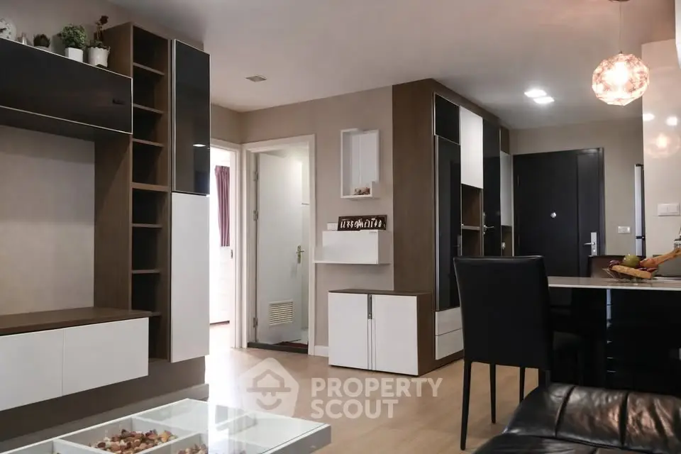 Modern living room with sleek furniture and open layout, perfect for contemporary urban living.