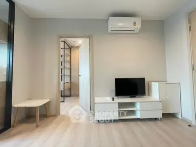 Modern living room with minimalist furniture and air conditioning