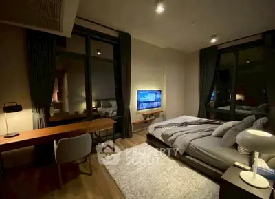 Luxurious bedroom with modern decor and large windows offering a serene ambiance.