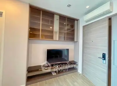 Modern living room with built-in TV unit and air conditioning