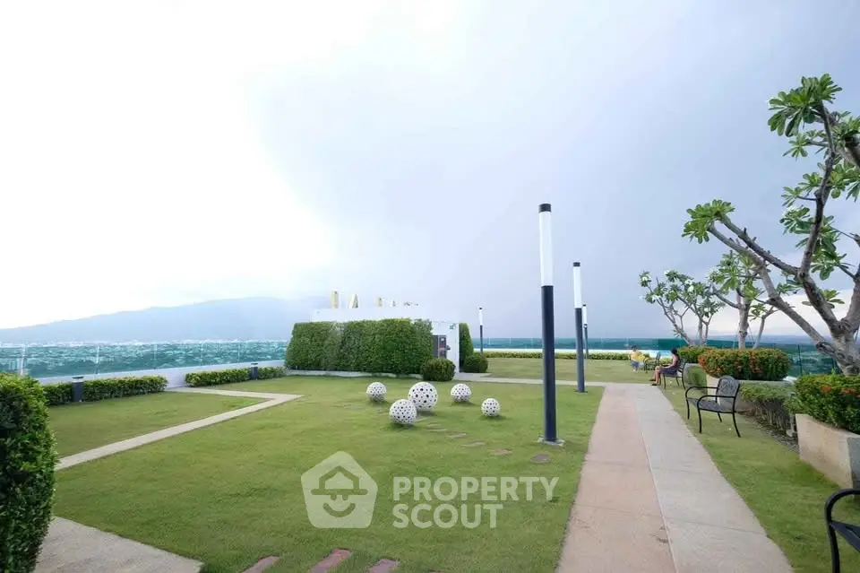 Stunning rooftop garden with panoramic views and modern landscaping, perfect for relaxation and gatherings.