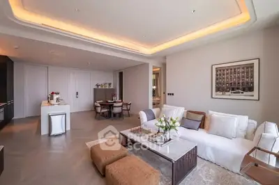 Luxurious modern living room with elegant decor and open layout, perfect for entertaining.