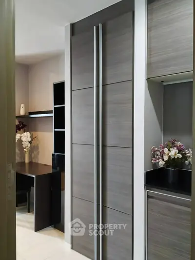 Modern kitchen with sleek cabinetry and elegant workspace, perfect for urban living.