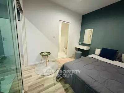 Modern bedroom with ensuite bathroom and stylish decor