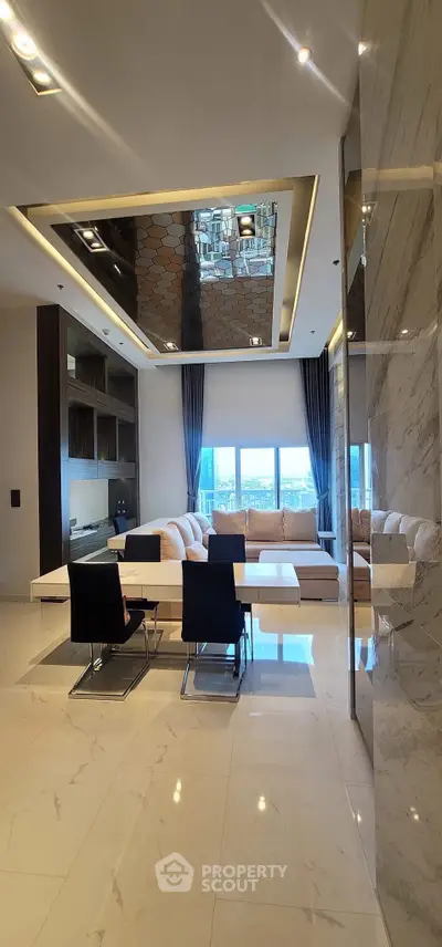 Luxurious modern living room with elegant decor and stunning city view.