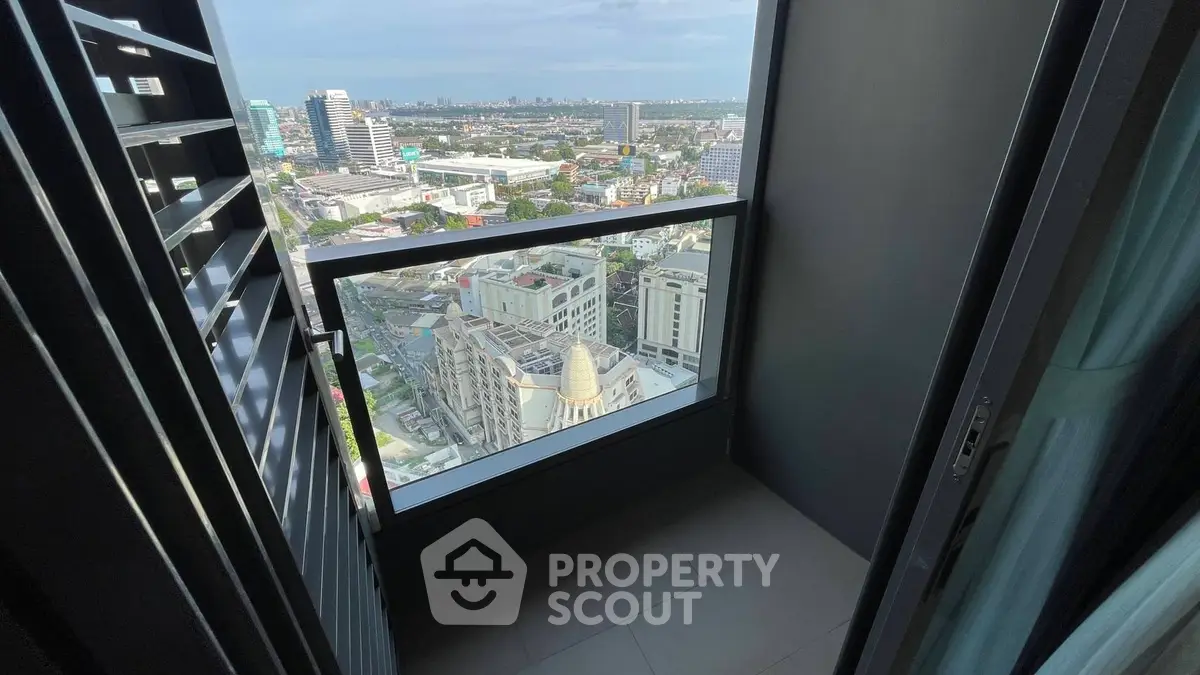 Stunning cityscape view from a high-rise balcony, perfect for urban living enthusiasts.