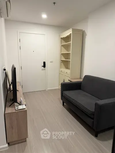 Cozy living room with modern furniture and sleek flooring