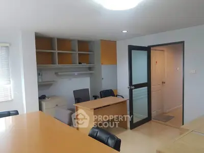 Spacious office interior with modern furniture and ample natural light