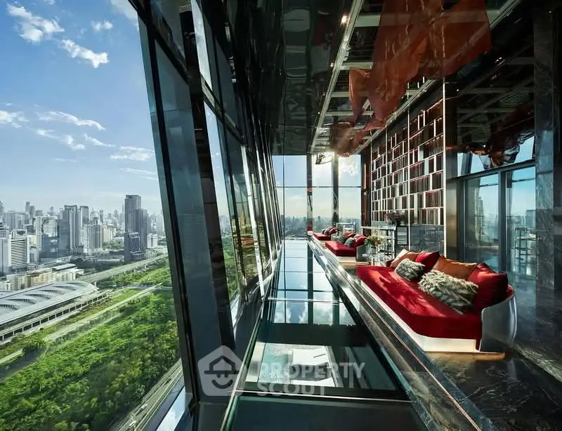 Luxurious high-rise living room with panoramic city views and modern decor.