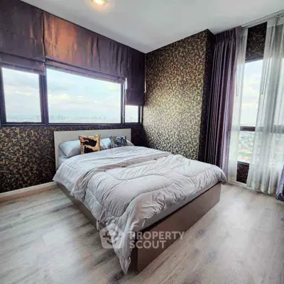 Luxurious bedroom with stunning city view and elegant decor