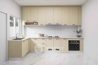 Modern kitchen with sleek cabinetry and gas stove in a bright, spacious layout.