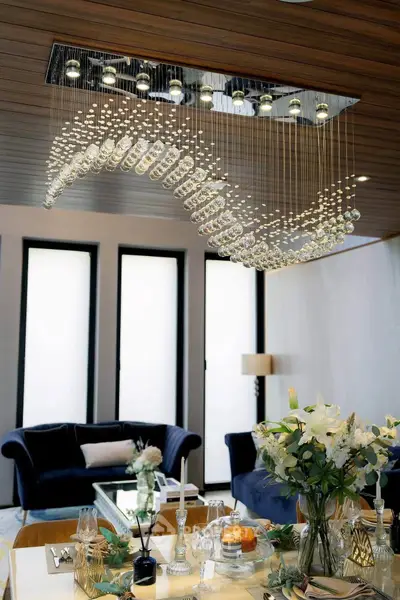 Luxurious living room with elegant chandelier and modern decor