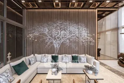 Luxurious modern living room with elegant decor and spacious seating area.