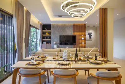 Luxurious modern living room with elegant dining area and stylish decor