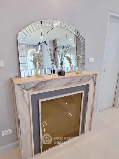 Elegant interior with decorative fireplace and mirror in modern living room