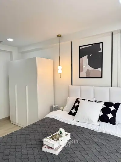 Modern bedroom with stylish decor and cozy ambiance