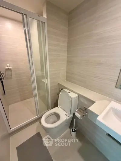 Modern bathroom with sleek shower and contemporary fixtures