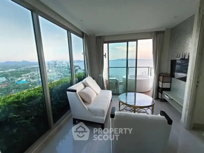 Luxurious living room with stunning panoramic view and elegant decor