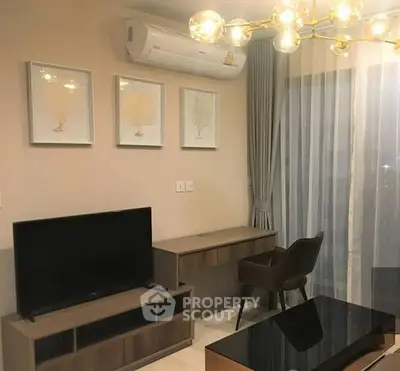 Modern living room with stylish decor and elegant lighting