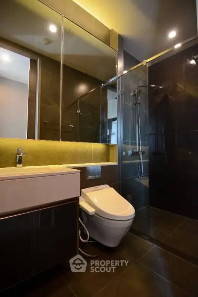 Luxurious modern bathroom with sleek design and glass shower enclosure