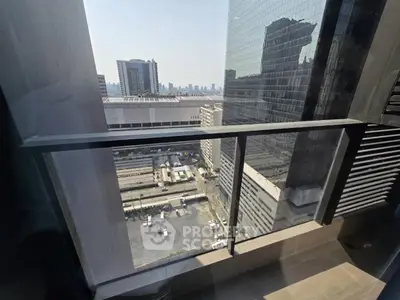 Stunning cityscape view from a high-rise balcony, perfect for urban living enthusiasts.