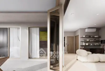 Modern living room with stylish furniture and open layout, featuring a cozy sofa and contemporary decor.