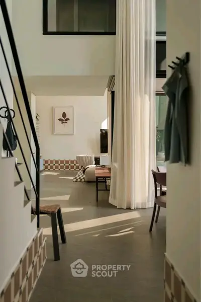 Stylish modern living room with high ceilings and elegant decor