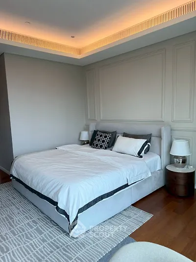 Luxurious modern bedroom with elegant lighting and stylish decor