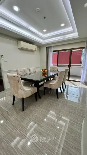 Elegant dining room with modern furniture and large windows for natural light