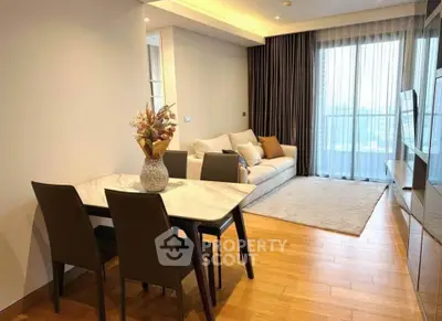 Modern living room with elegant dining area and large window view