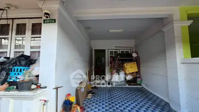 Spacious garage with storage potential in residential property