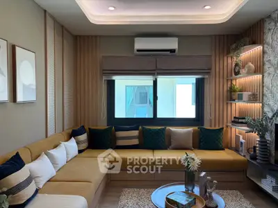 Stylish living room with modern decor, large window, and cozy seating area, perfect for relaxation.