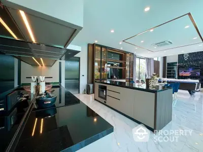 Luxurious open-layout kitchen with modern appliances and sleek design