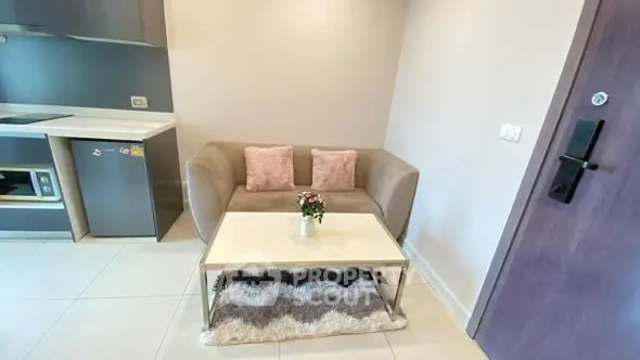 Cozy living area with modern kitchen and stylish decor